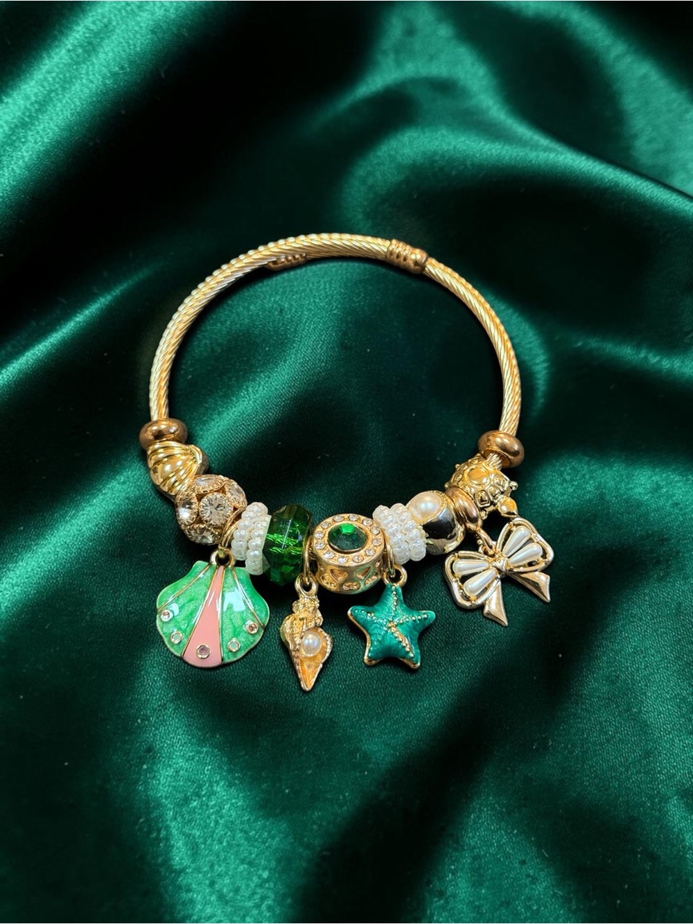 Gold Charm Twisted Bangle Bracelet with Green Enamel Charms